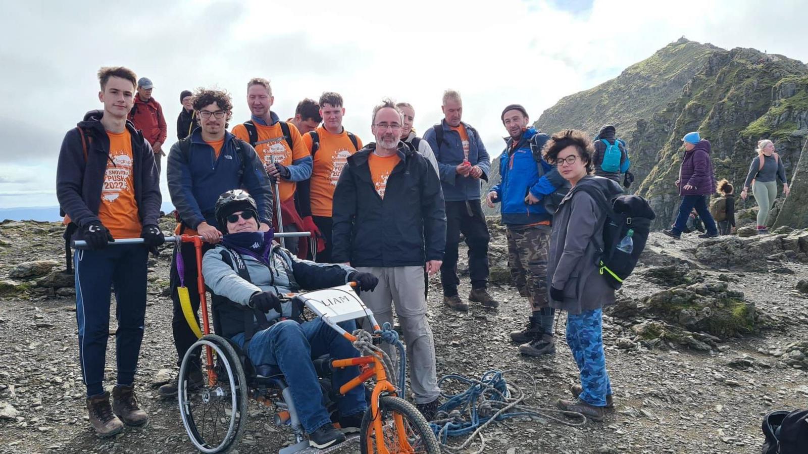 Liam Blaney and his team at the top of Snowdon