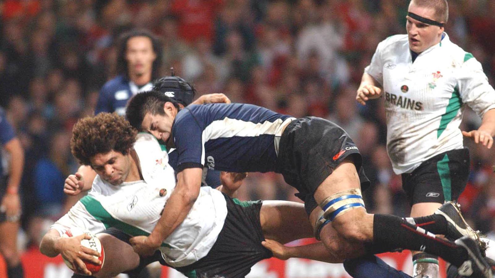 Colin Charvis, who became the first Wales forward to score four tries in one Test in the 98-0 in against Japan in 2004, scores his third