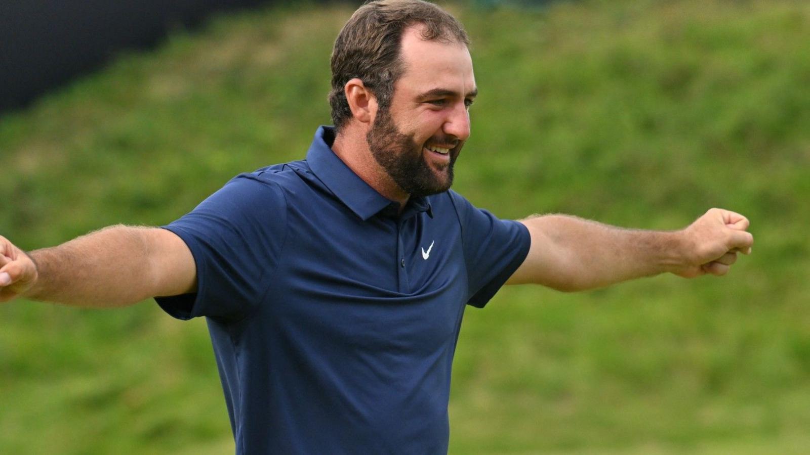Scottie Scheffler celebrates winning The Open at Royal Portrush