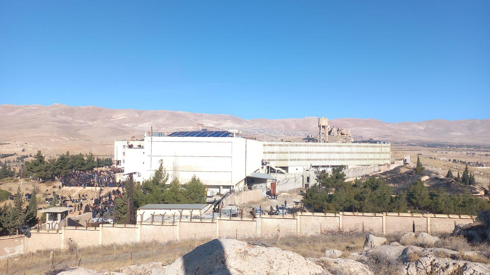 The Saydnaya Prison outside Damascus. The prison can be seen in the centre of the photo surrounded by high walls and guard towers. 