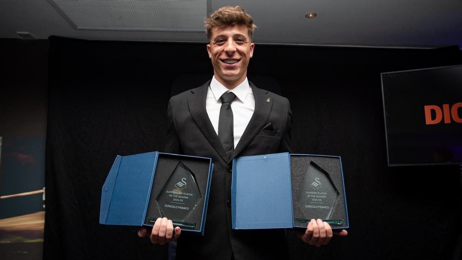 Goncalo Franco with his awards