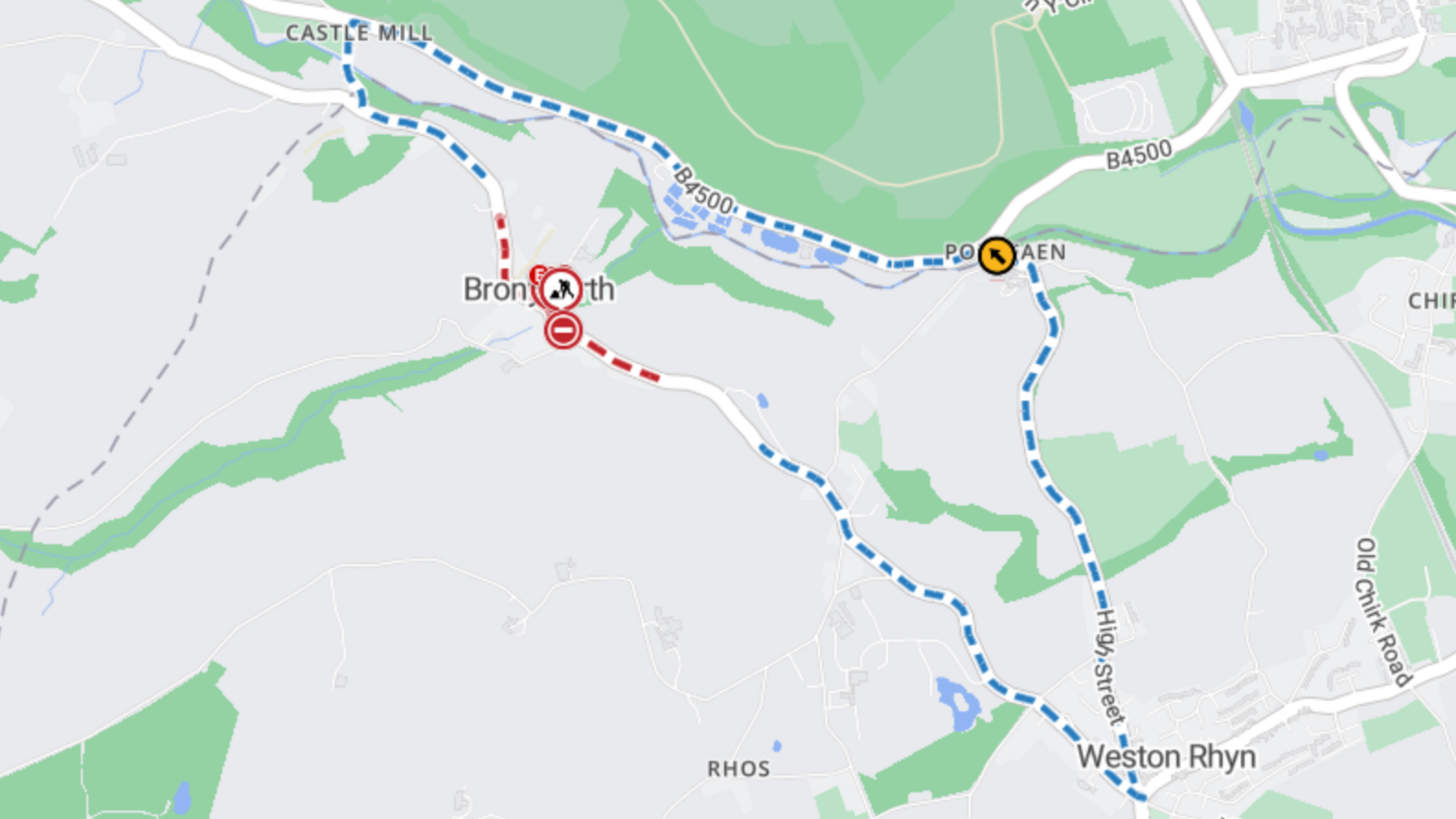 A map shows the diversion which is in place during the Bronygarth road closure. A red dotted line indicates where the road is closed, while a blue dotted line shows the diversion route, which goes into Wales. 