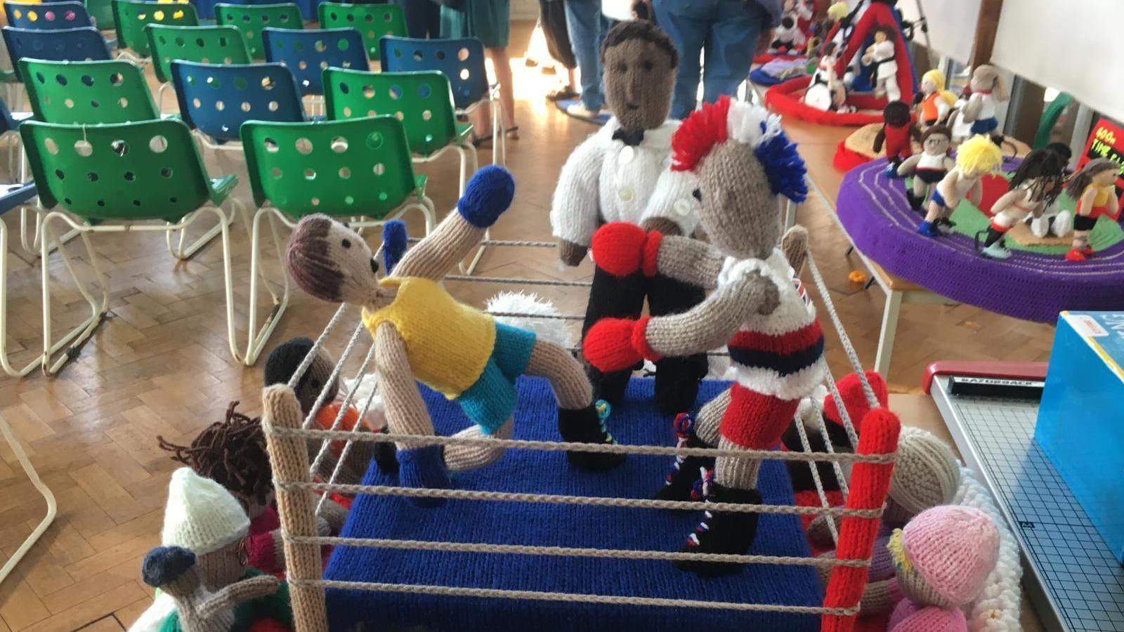 Boxing represented in wool as a post box topper