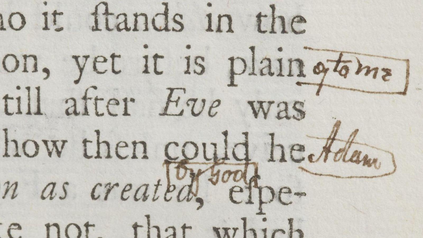 Close up of book text with handwriting saying 'Adam'