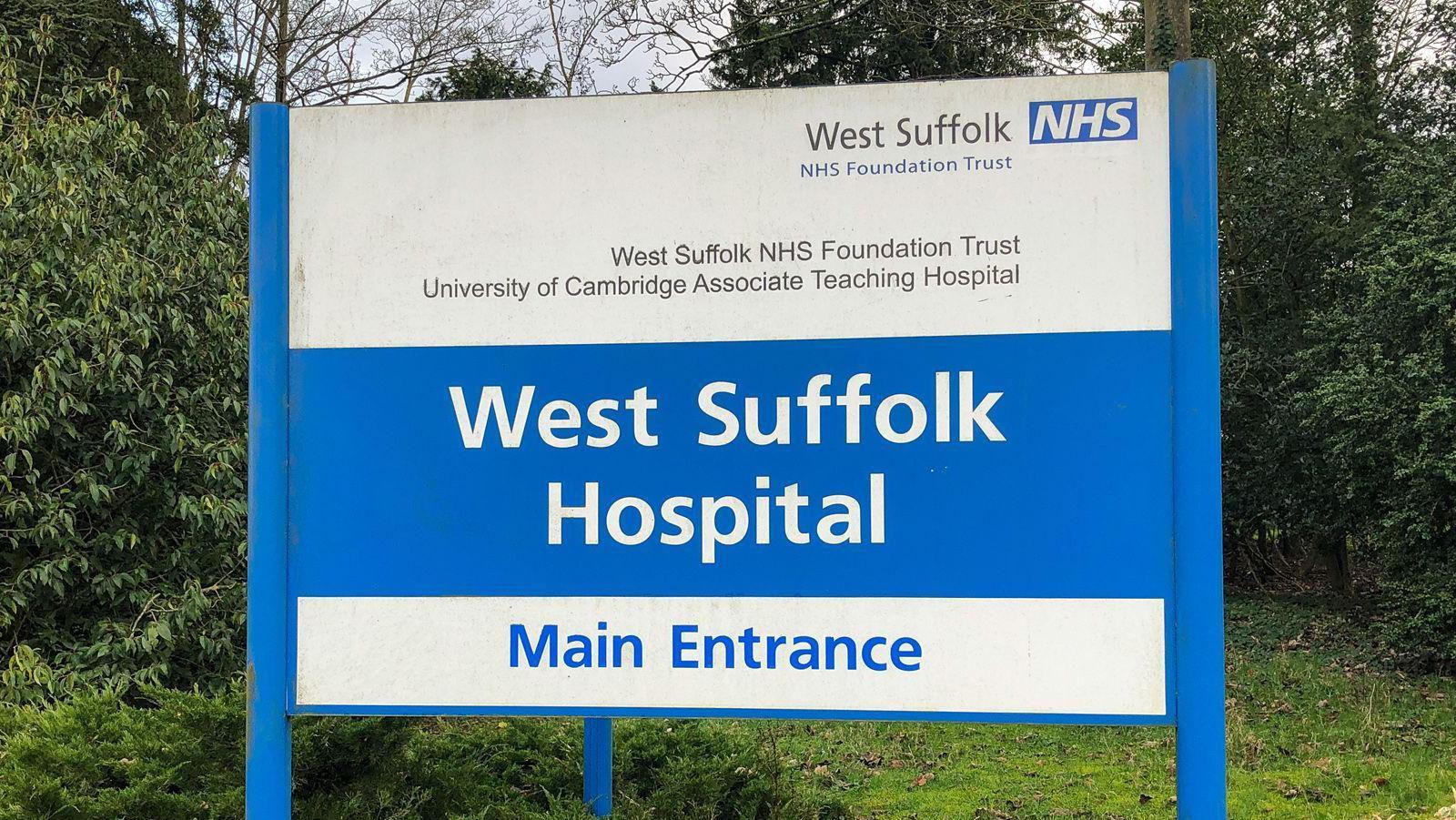 Hospital sign in blue and white