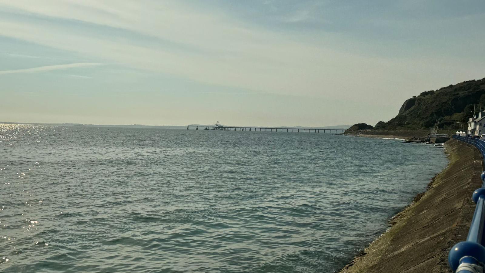 A landscape shot of the shores of Belfast Lough which shows the Cloghan Point facility in the distance