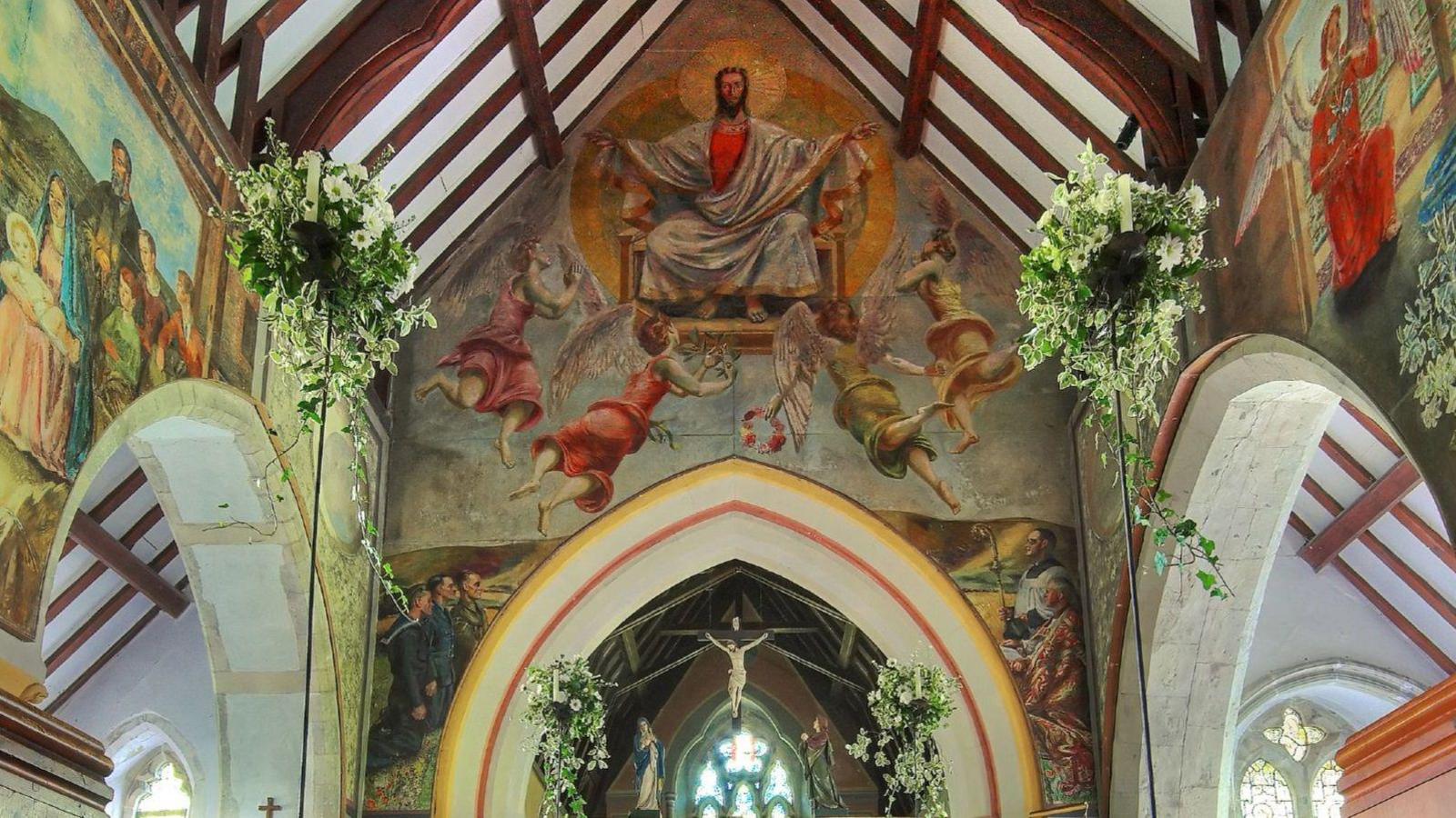 Murals painted on the walls inside a church