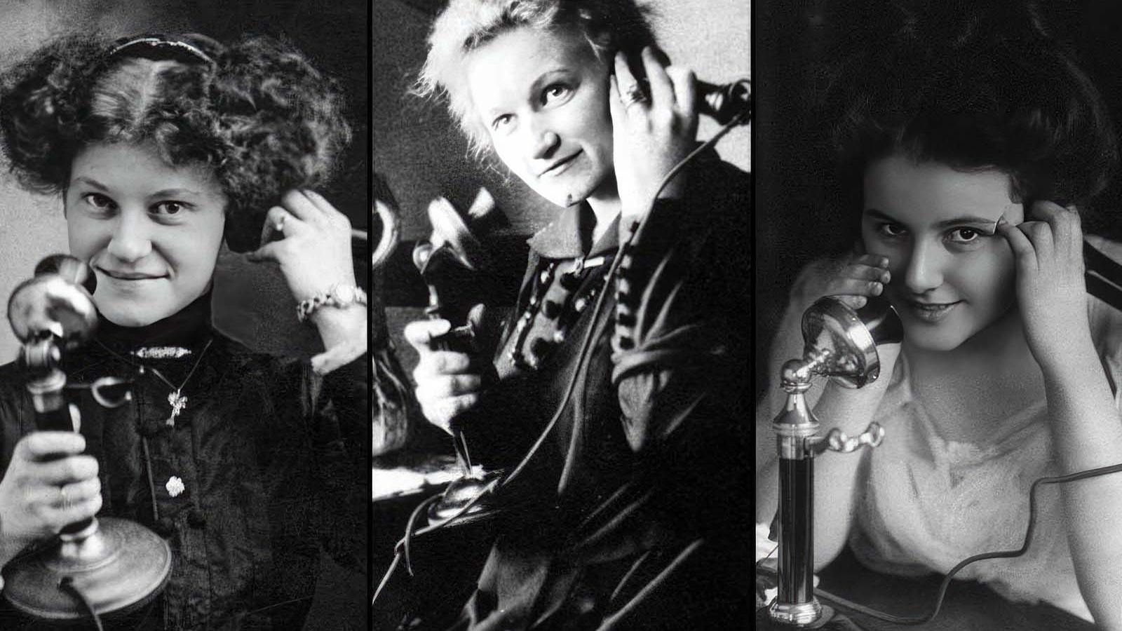 Three Victorian women using telephones of the day. They are holding a separate mouthpiece and earpiece