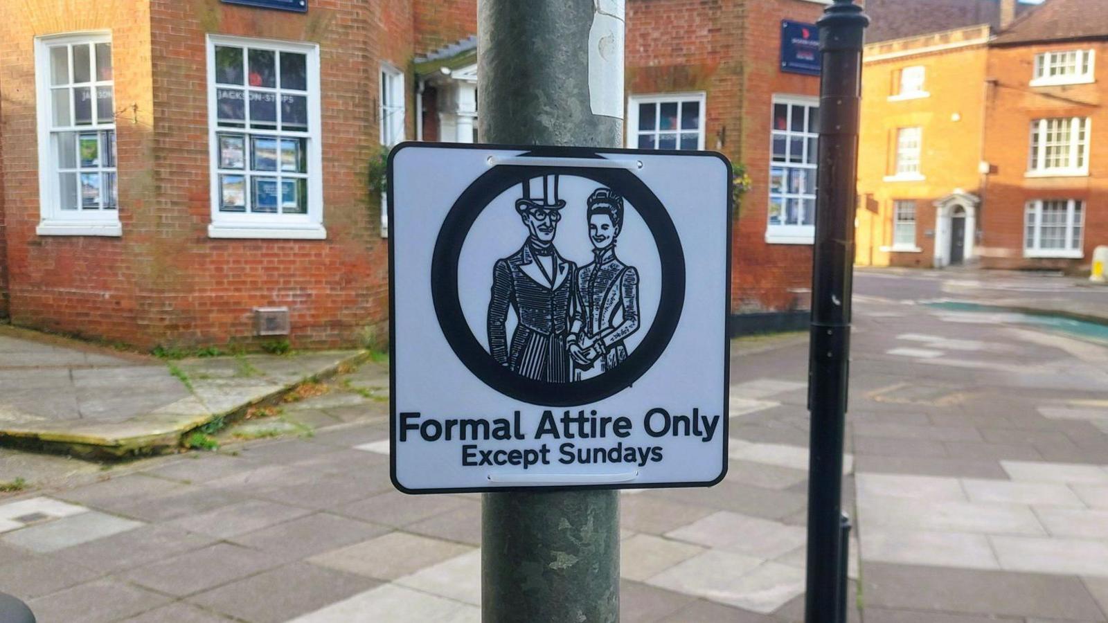 A comic sign reads: Formal attire only - except Sundays