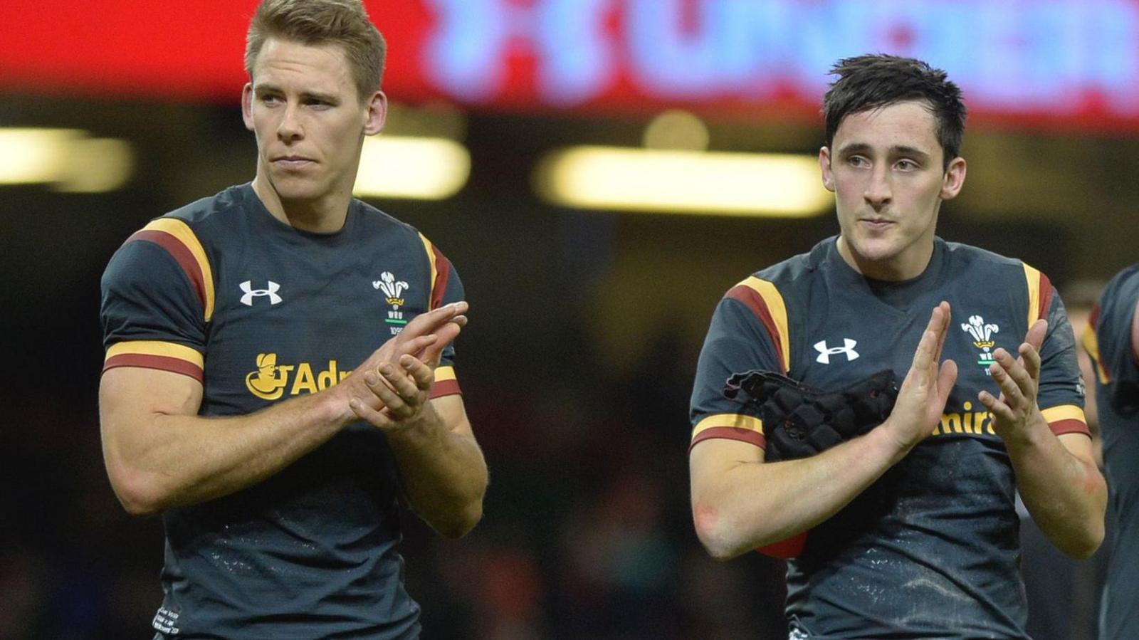 Sam Davies (right) and Liam Williams (left) clap the Wales crowd in 2016