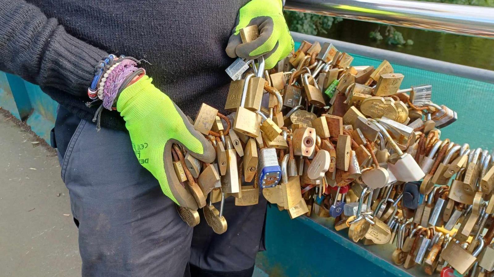 Mike Hall holds some of the love locks