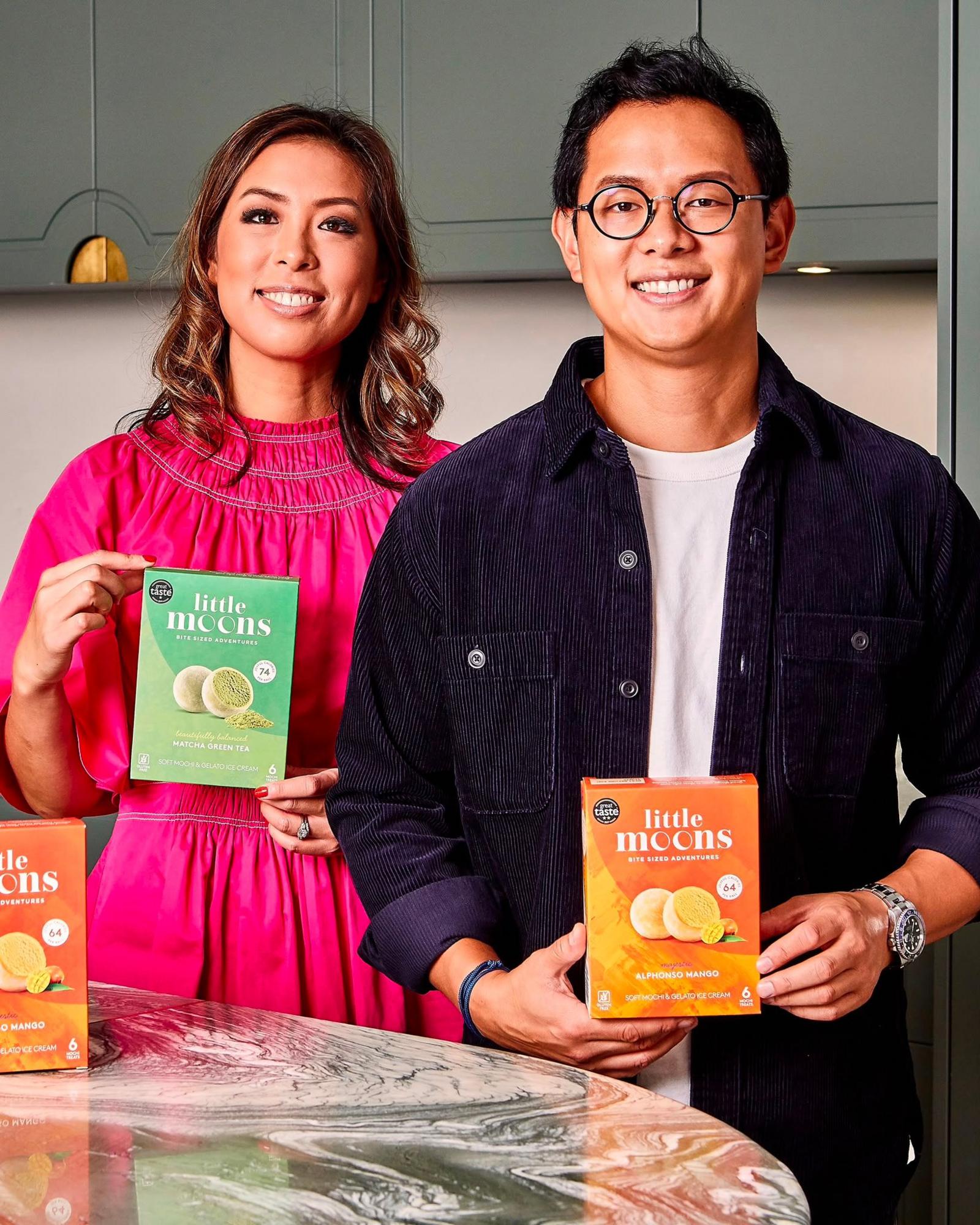 Vivien and Howard Wong holding boxes of Little Moons