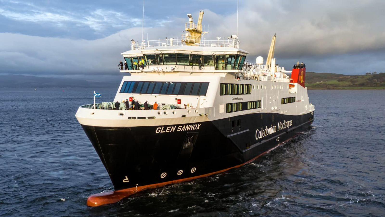 A black and white ship with red funnels sailing on the Clyde, diagnoinally towards the camera