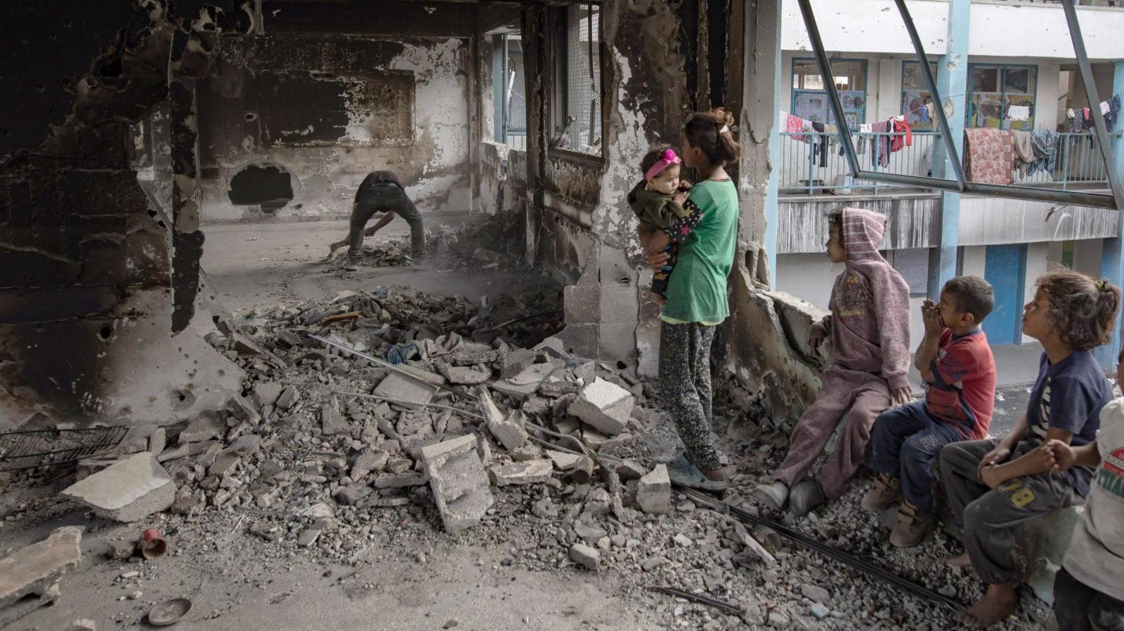 Displaced Palestinians in a damaged UN school in Khan Younis, Gaza Strip. Photo: 19 May 2024