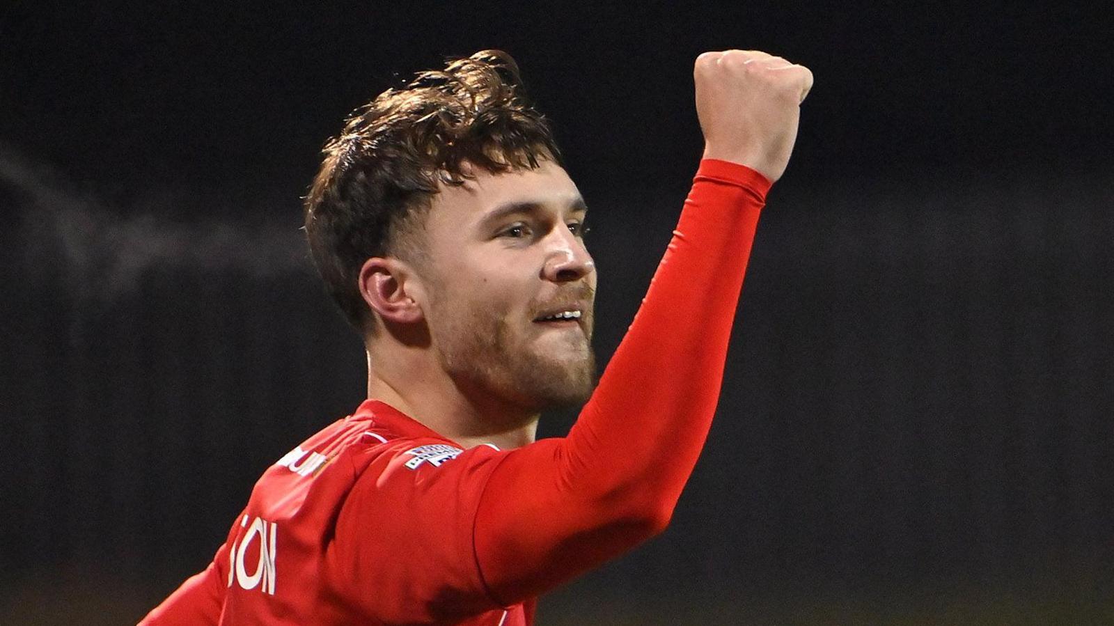 Ben Wilson celebrates scoring for Cliftonville against Crusaders at Solitude