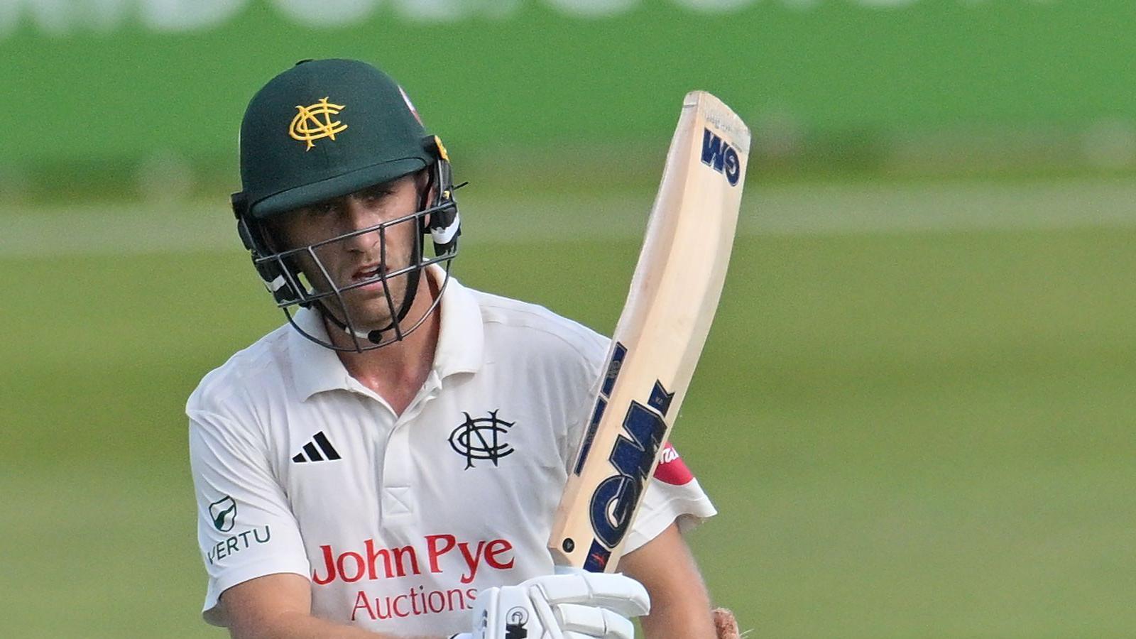 Olly Stone raises the bat for Nottinghamshire