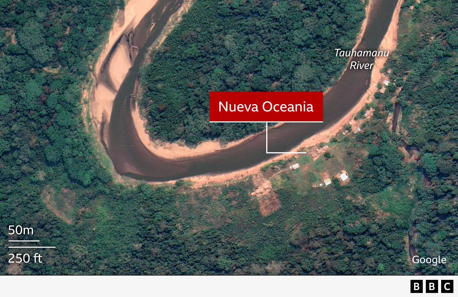 Satellite view of a winding river surrounded by dense green forest. The river is labeled “Tauhamanu River,” and a red marker indicates “Nueva Oceania” along the riverbank. Several small structures are visible near the marker, and a scale in the bottom left shows distances of 50 meters and 250 feet. The image includes Google and BBC branding.