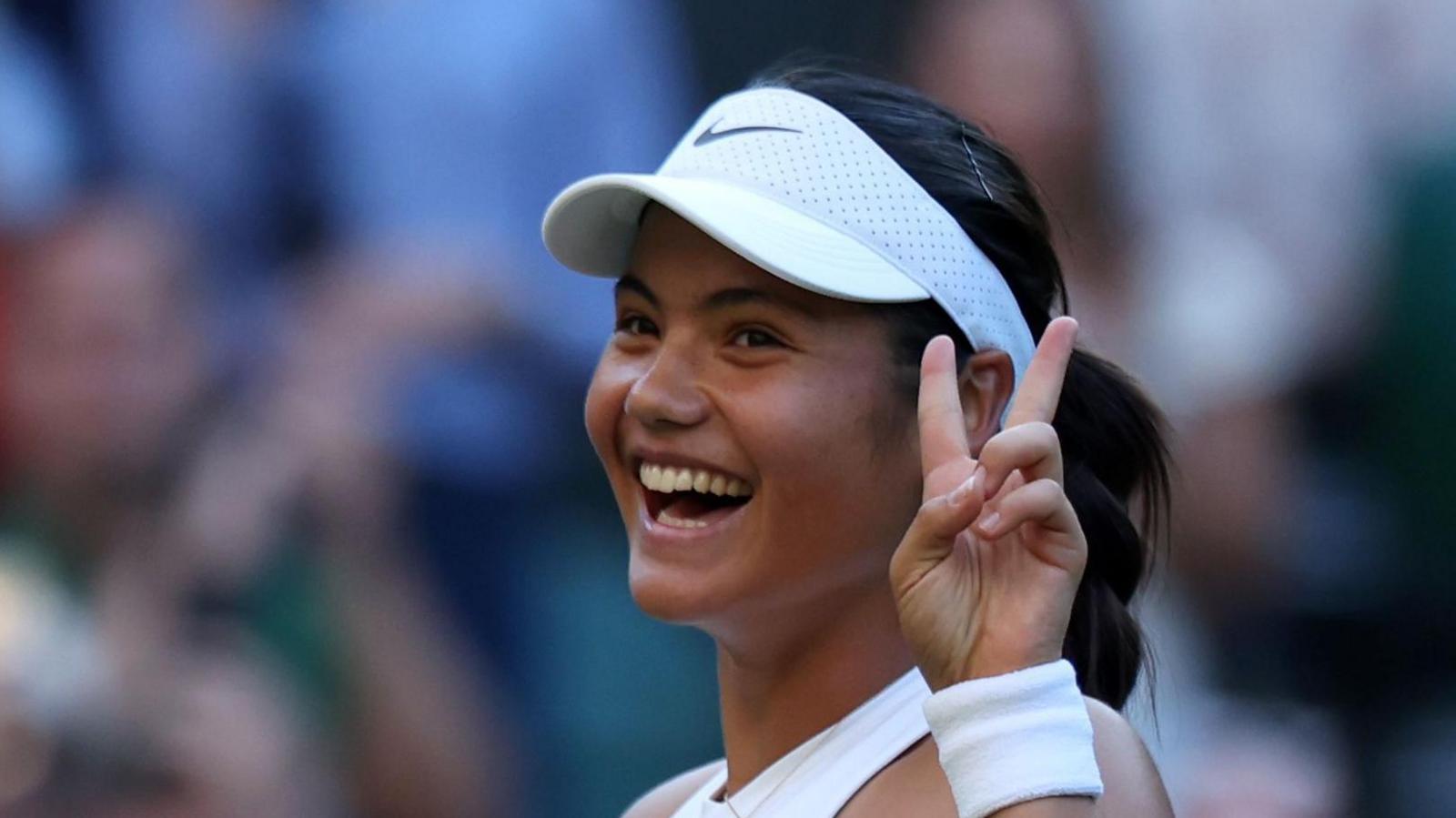 Emma Raducanu celebrates beating Marketa Vondrousova at Wimbledon