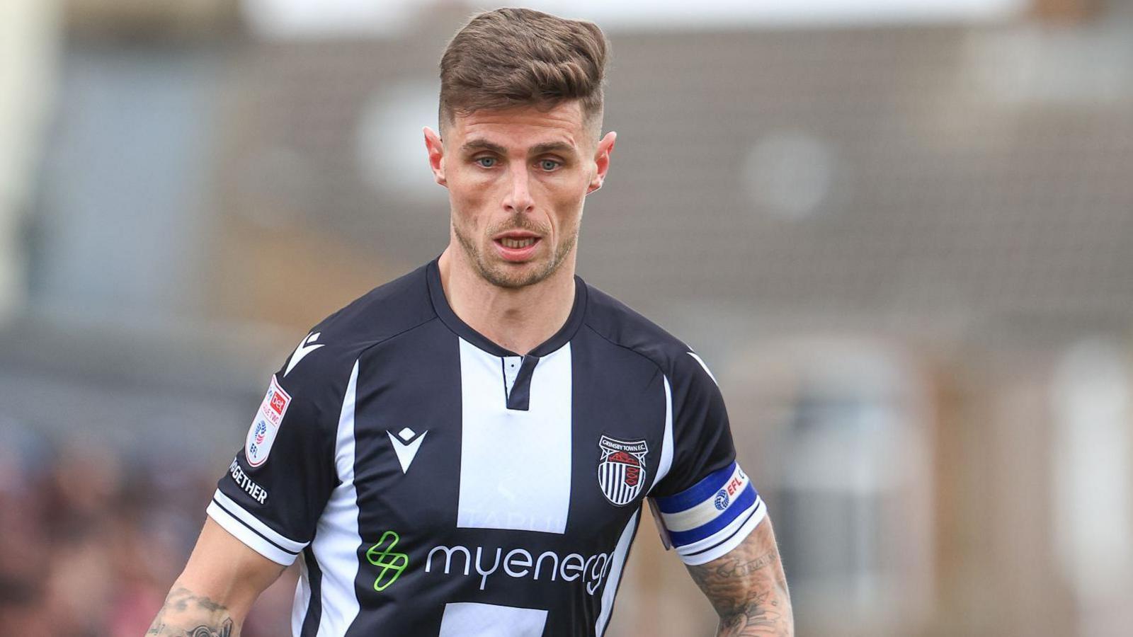 Grimsby midfielder Gavan Holohan