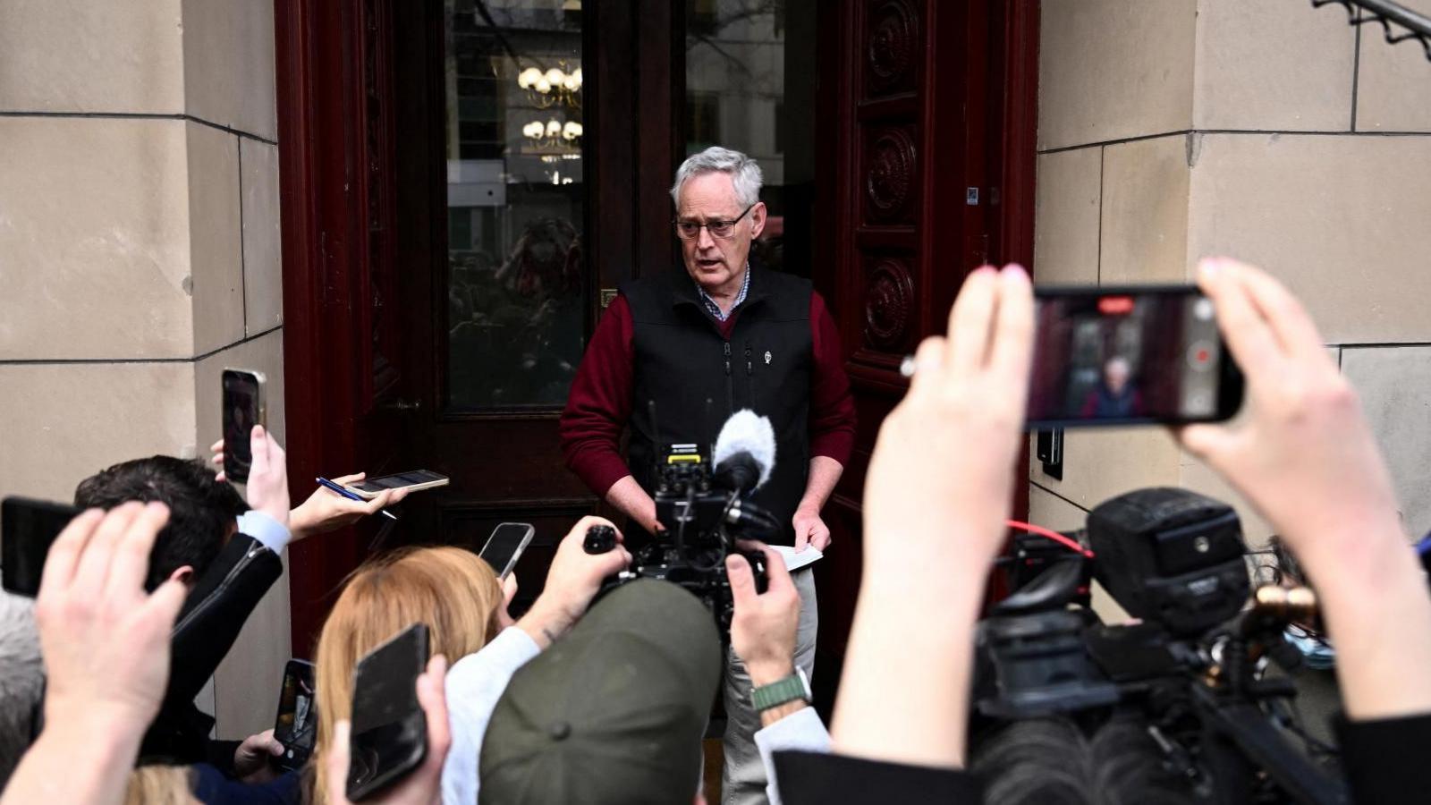 Ian Wilkinson, the sole surviving guest of a deadly mushroom lunch served by convicted murderer Erin Patterson, speaks to media as he leaves the Supreme Court of Victoria in Melbourne