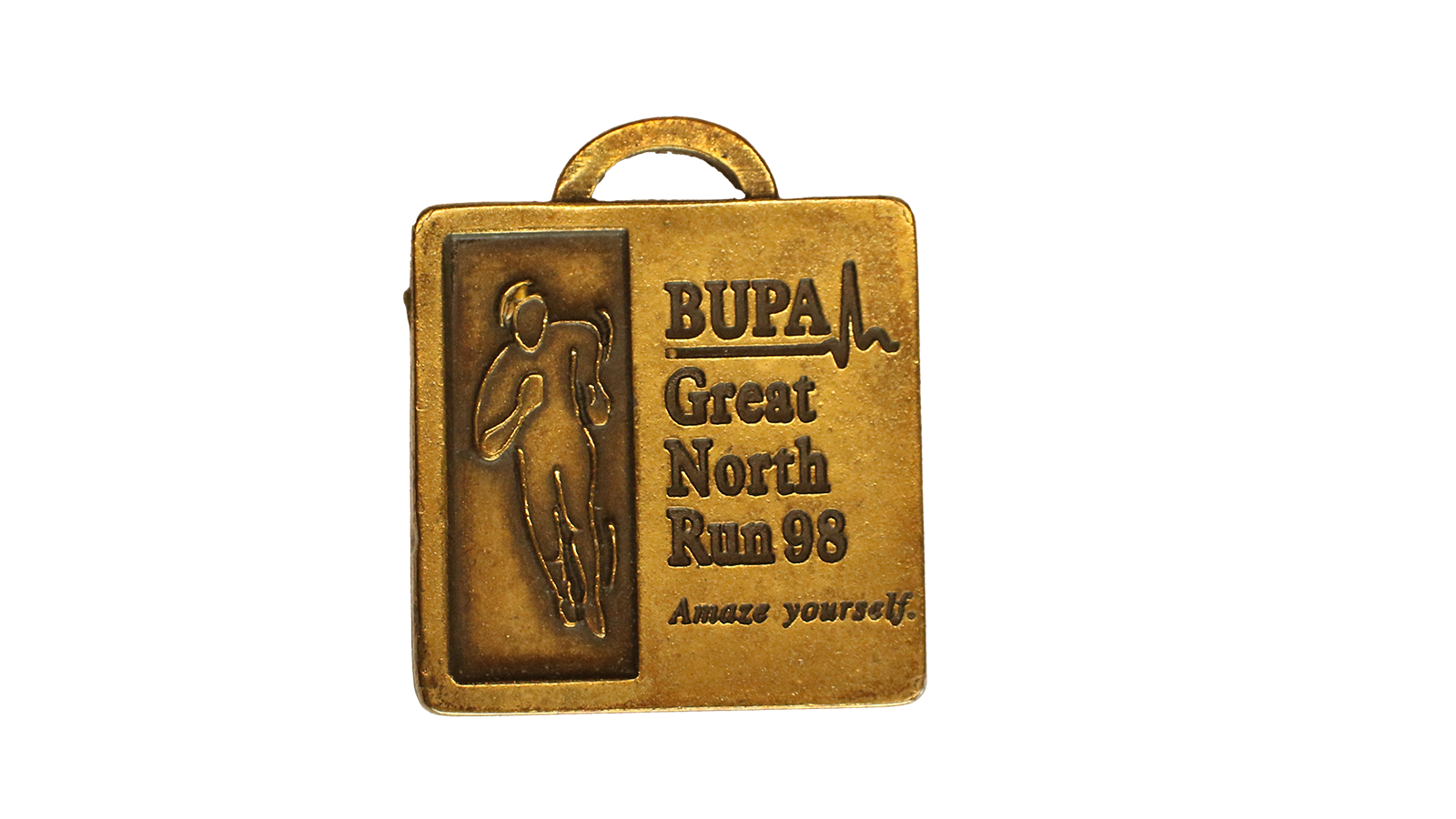 A square shaped gold medal that has a has a silhouette shaped person running. It reads 'Bupa Great North Run 98.