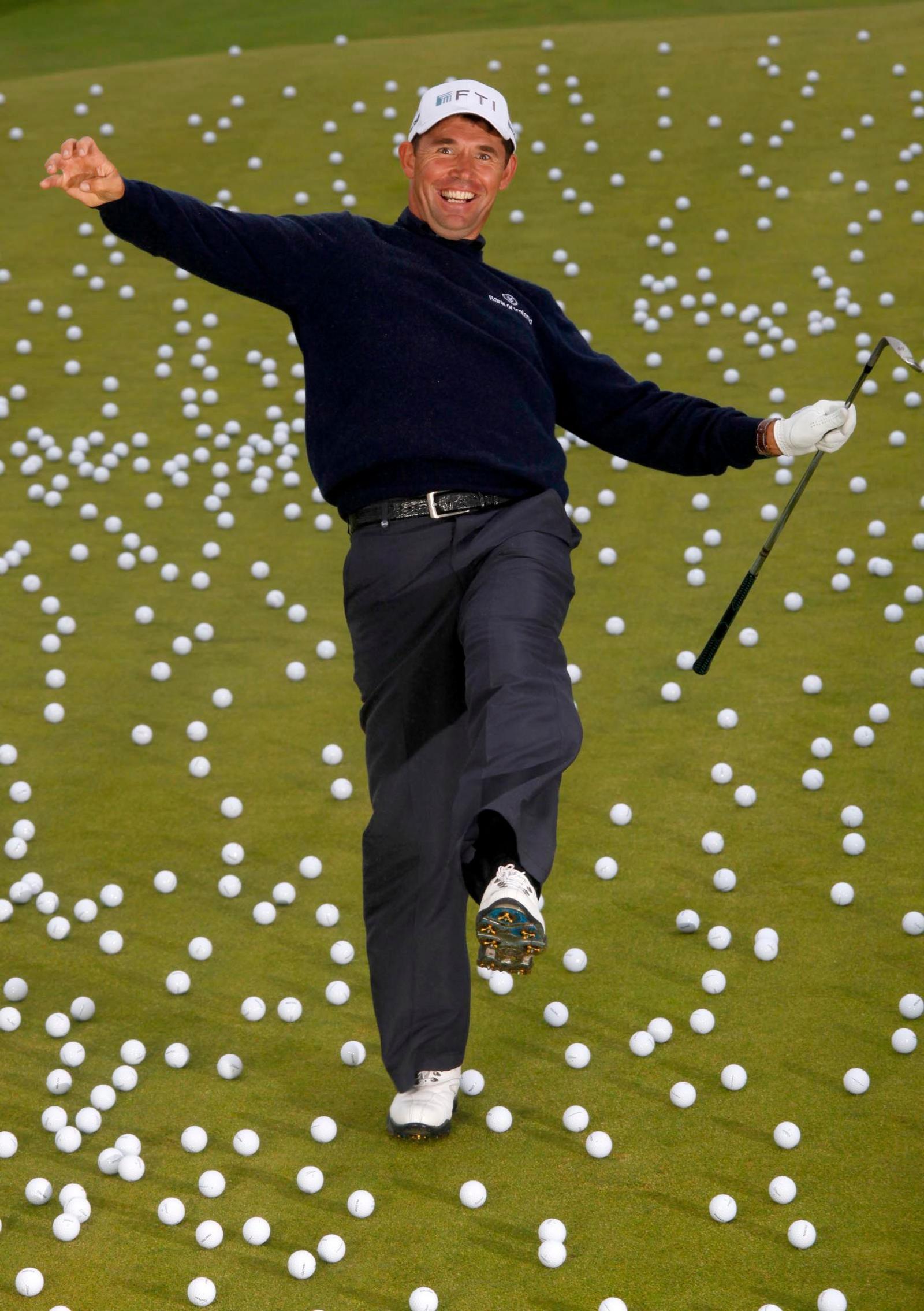 Padraig Harrington on a green with dozens of golf balls