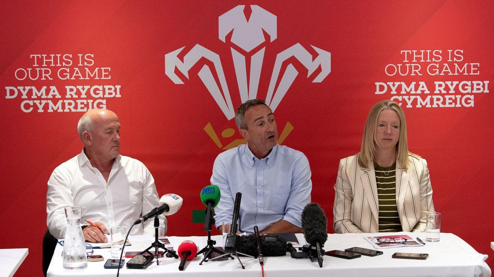Welsh Rugby Union chair Richard Collier-Keywood, director of rugby Dave Reddin and chief executive Abi Tierney address the media