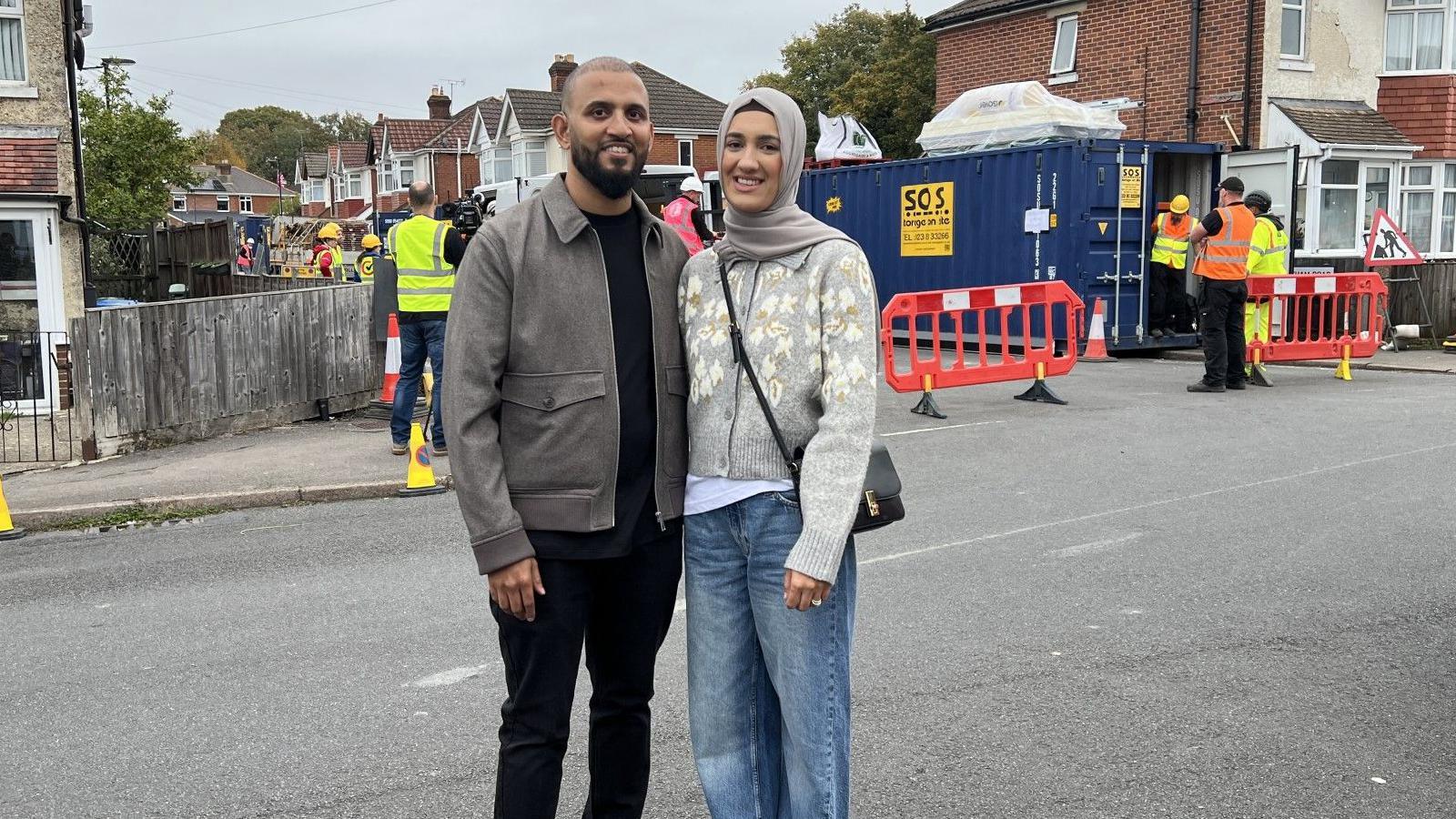 Ahmed and Rifat Ali stand on a residential street corner in Southampton.