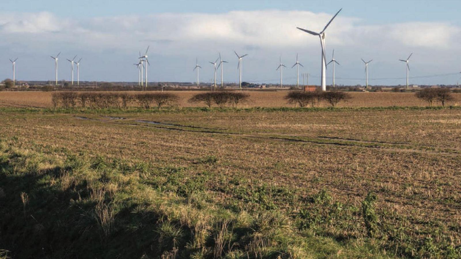 Wind turbines on farmland at Conisholme, Lincolnshire. Solar panels are due to be installed nearby.