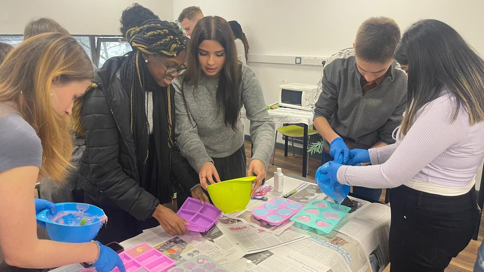 Students making soap