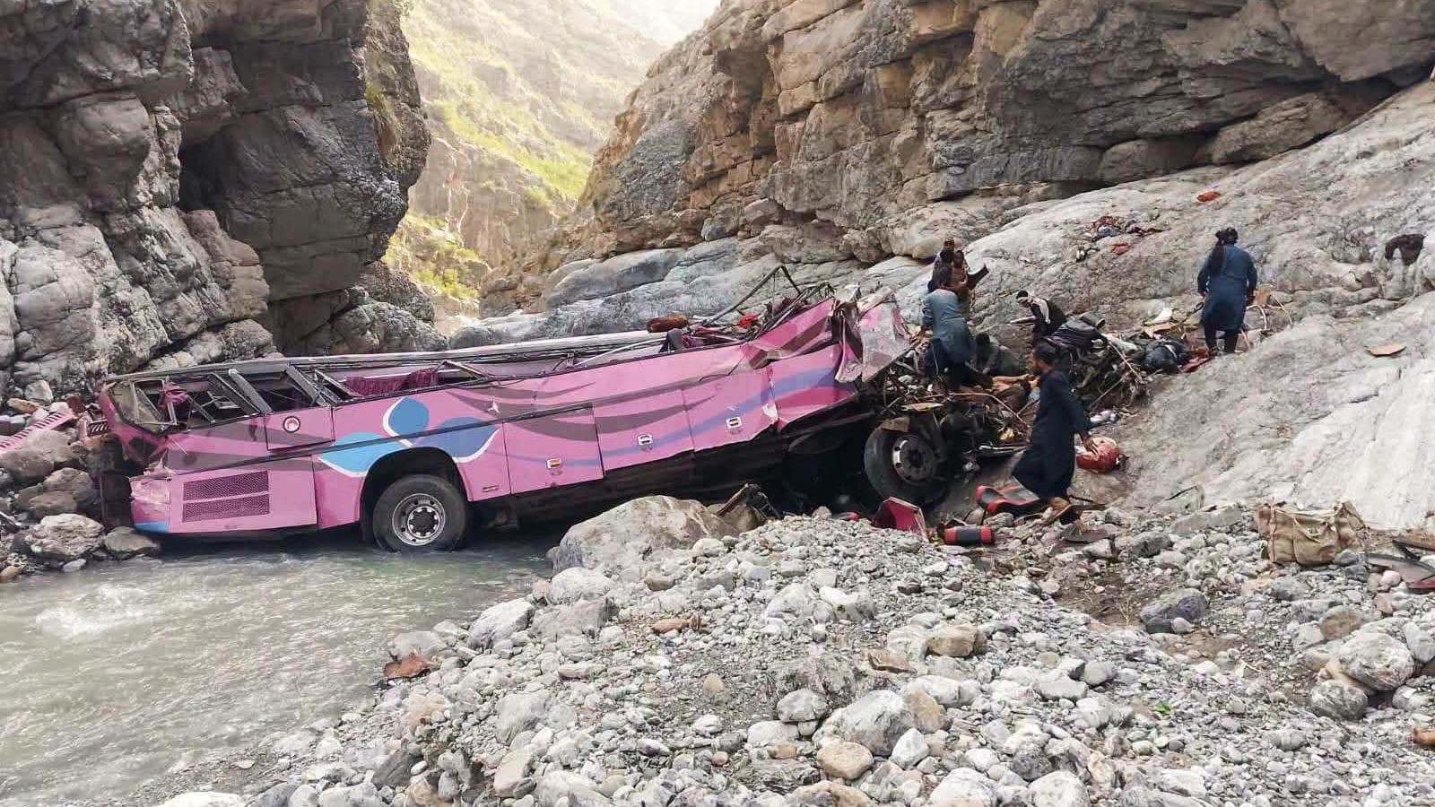 A bus badly damaged after crashing into a ravine