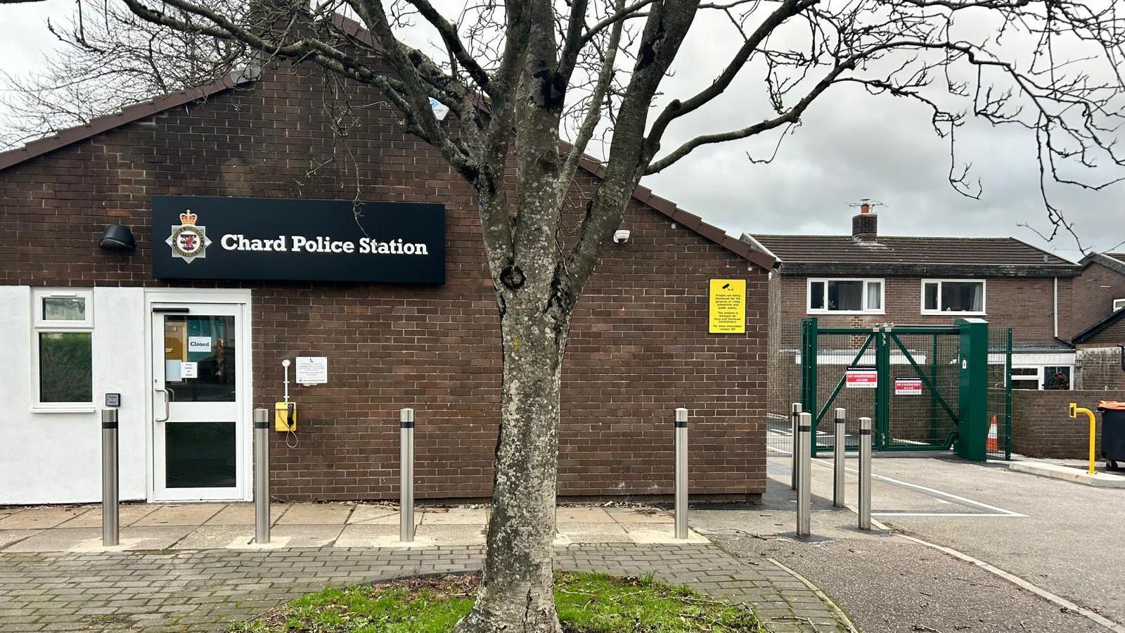 Picture of bricked building with giant sign saying Chard Police Station