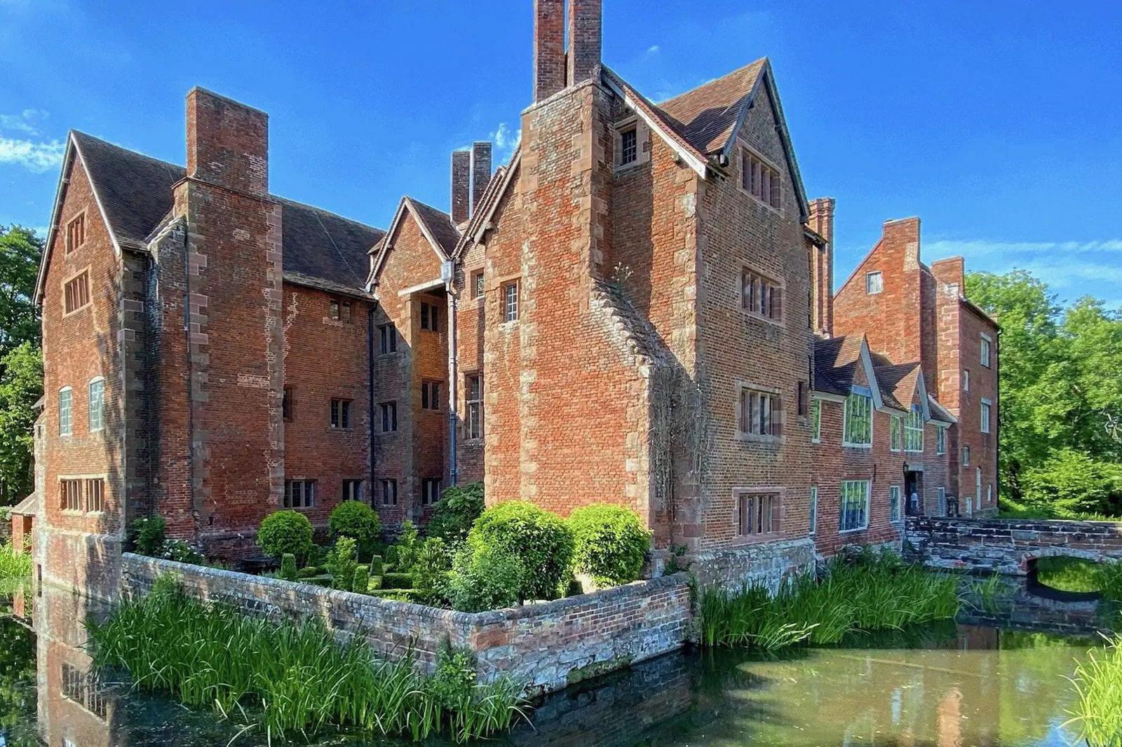 Harvington Hall sits amid a moat