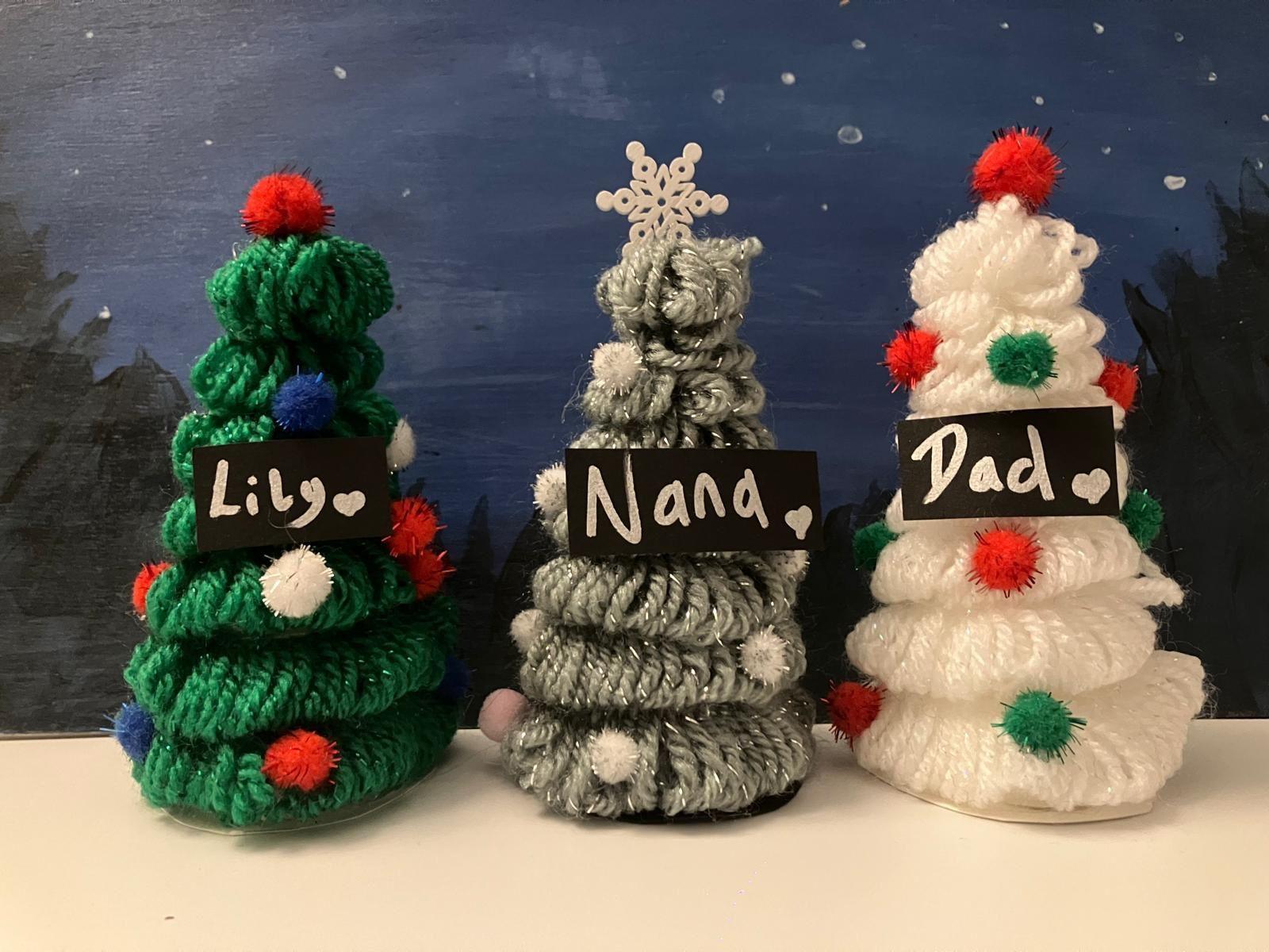 A picture of the decorations Lily-Rae and her mum have been making. Here is a set of three small wool Christmas trees.