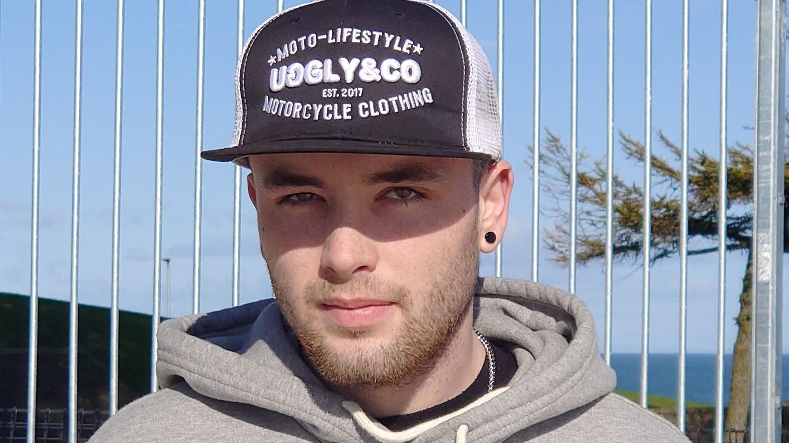 A young man stands in the new skate park facility 