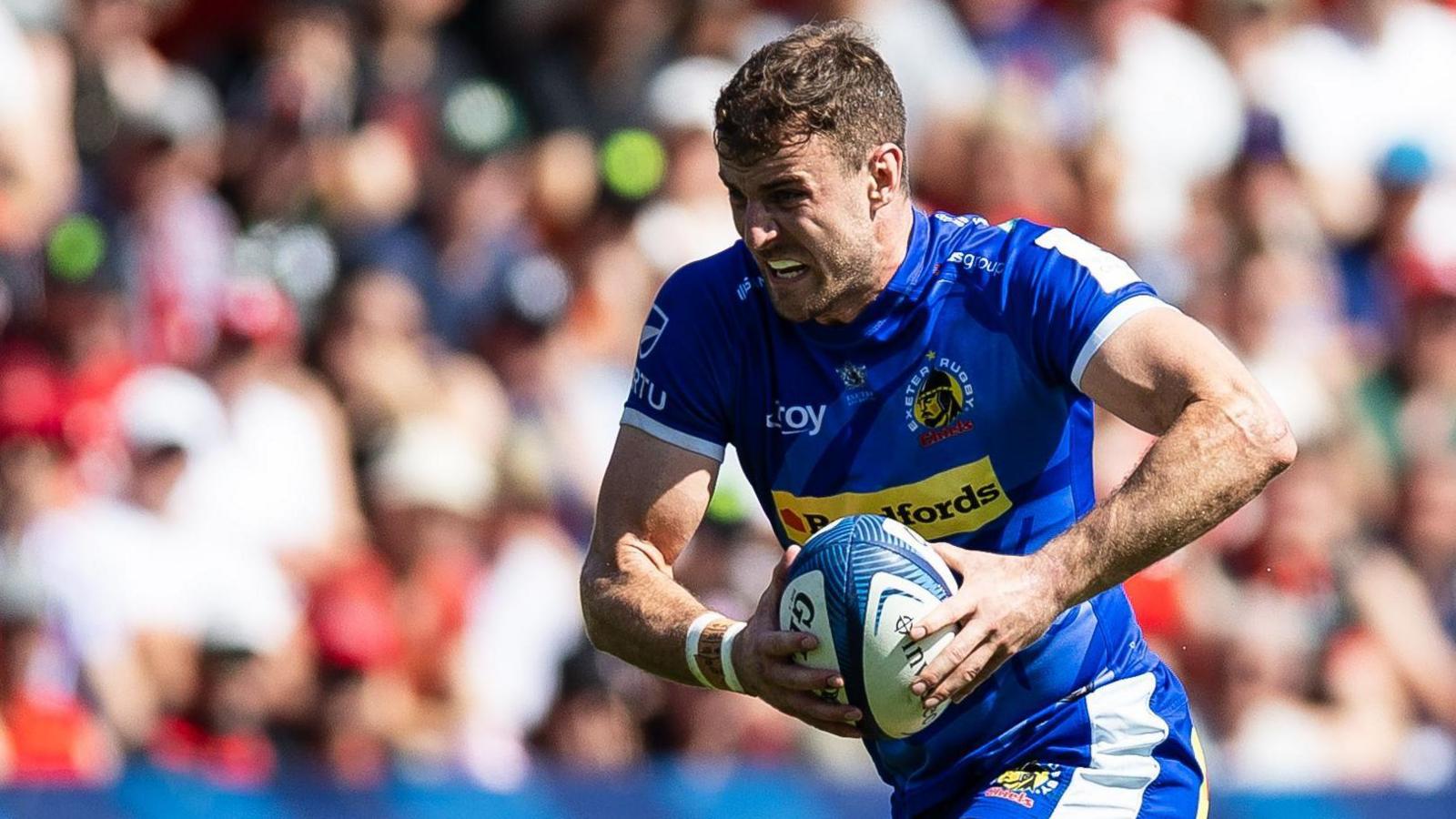 Ollie Devoto running with the ball during a game for Exeter last season.