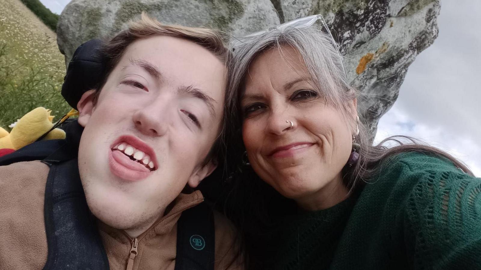 Oscar and his Mum Alex, posing for a selfie together in a field