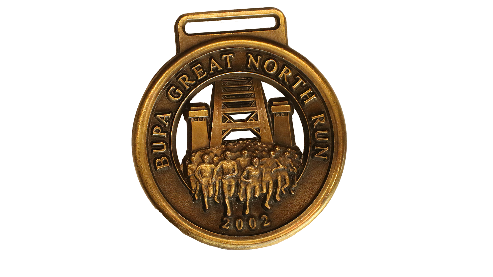 A circular dark gold shaped medal, it has a cut out in the middle and shows runners running towards the centre. It reads Bupa Great North Run at the top and 2002 at the bottom. 