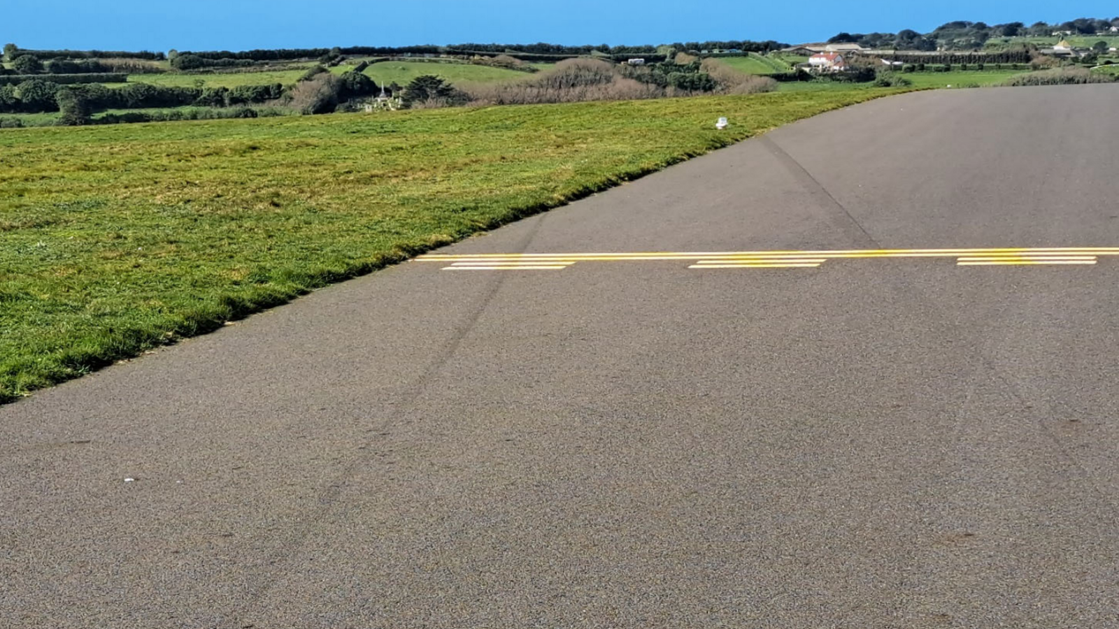 Tyre marks on the runway from where the aircraft left the paved surface