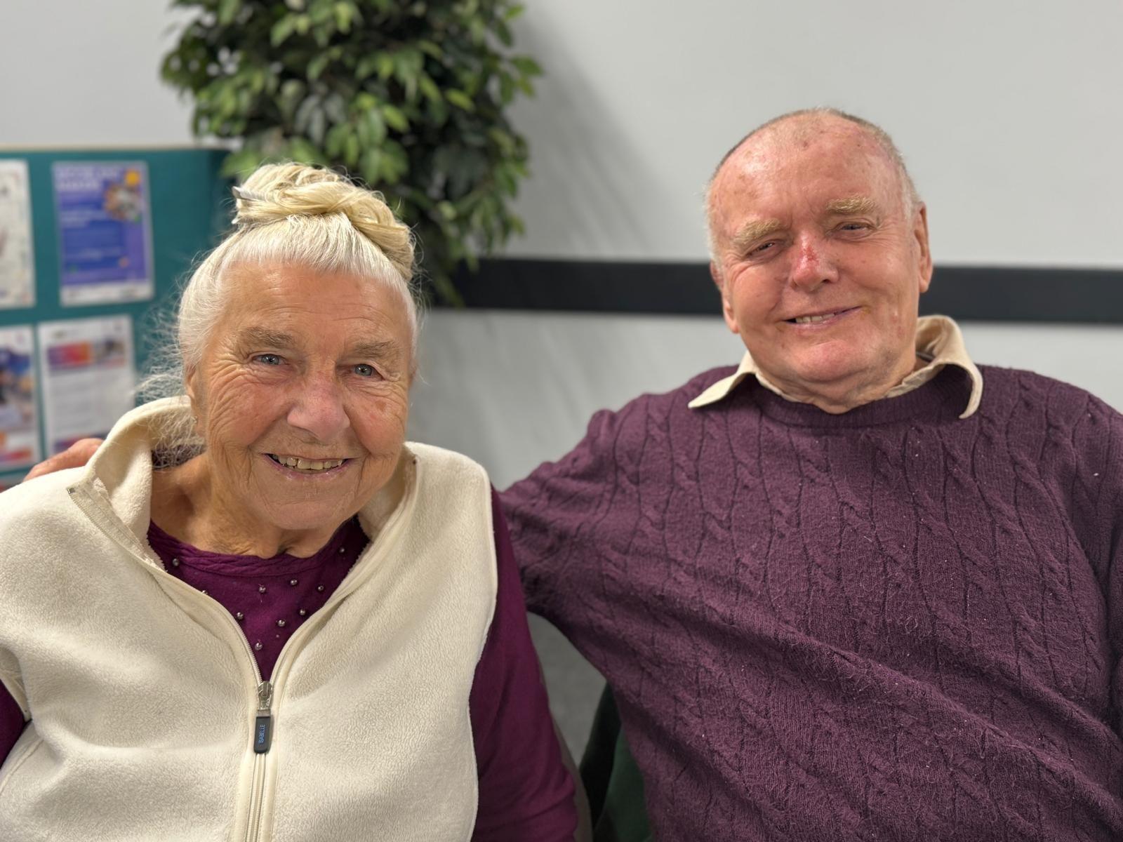 A head-and-shoulders photograph of Angela and Trevor Hallam