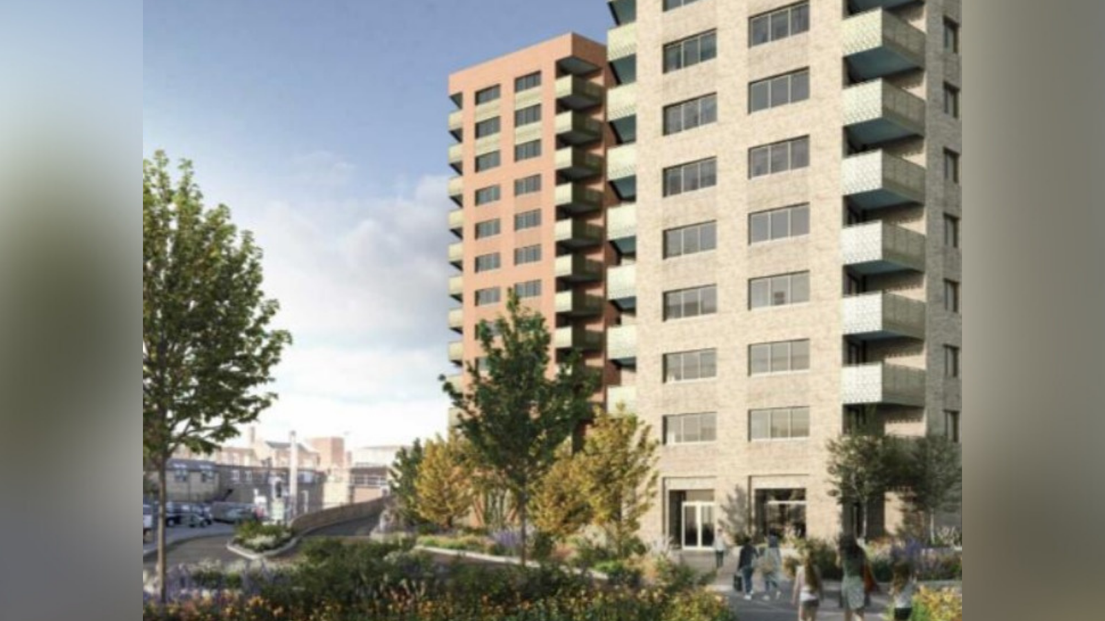 CGI visualisation from Thames Street of the proposed housing scheme on Elmsleigh Road, Staines. The mock-up shows two tower blocks, each with balconies on both the left and right-hand side. There is grass and trees at ground level.