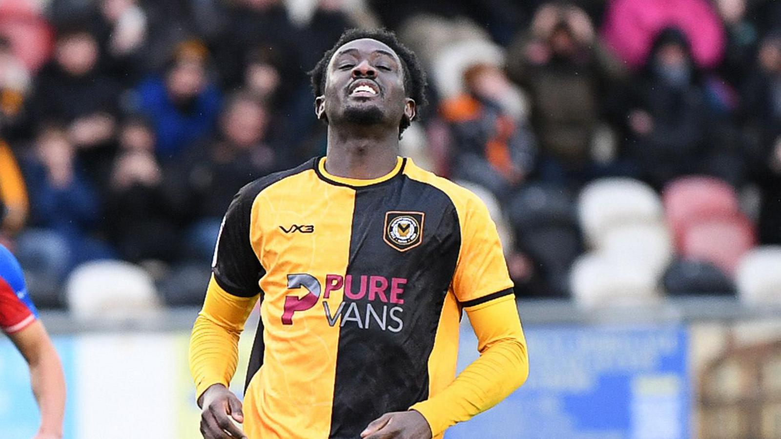 Nathan Opoku of Newport County misses his penalty 