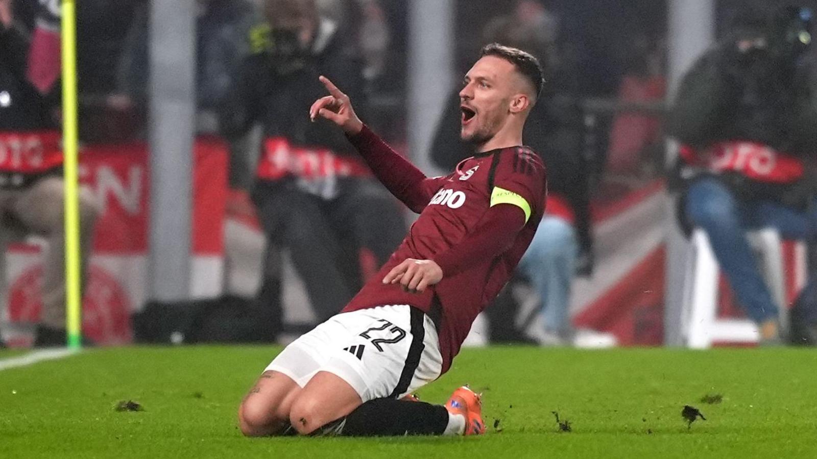 Lukas Haraslin celebrates