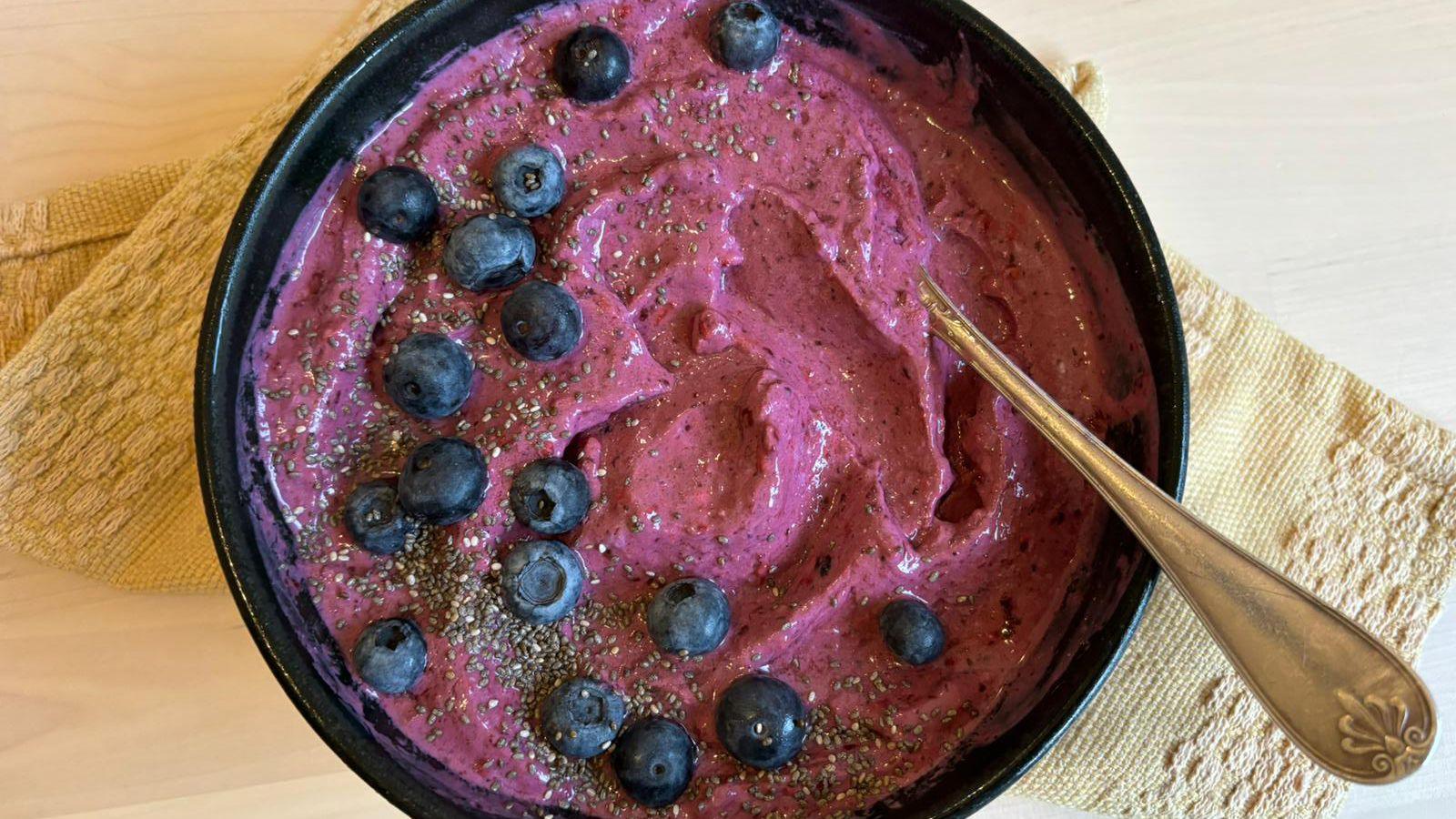 Silken tofu smoothie bowl with blueberries and chia seeds sprinkled on top