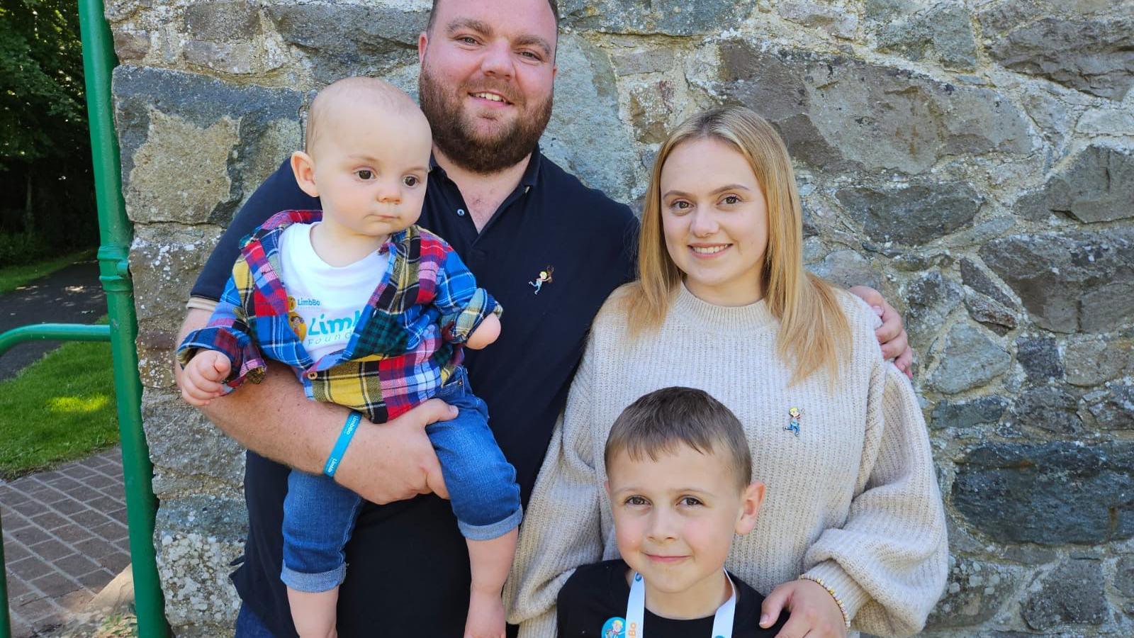 Arthur with his mum and dad and brother Ifan