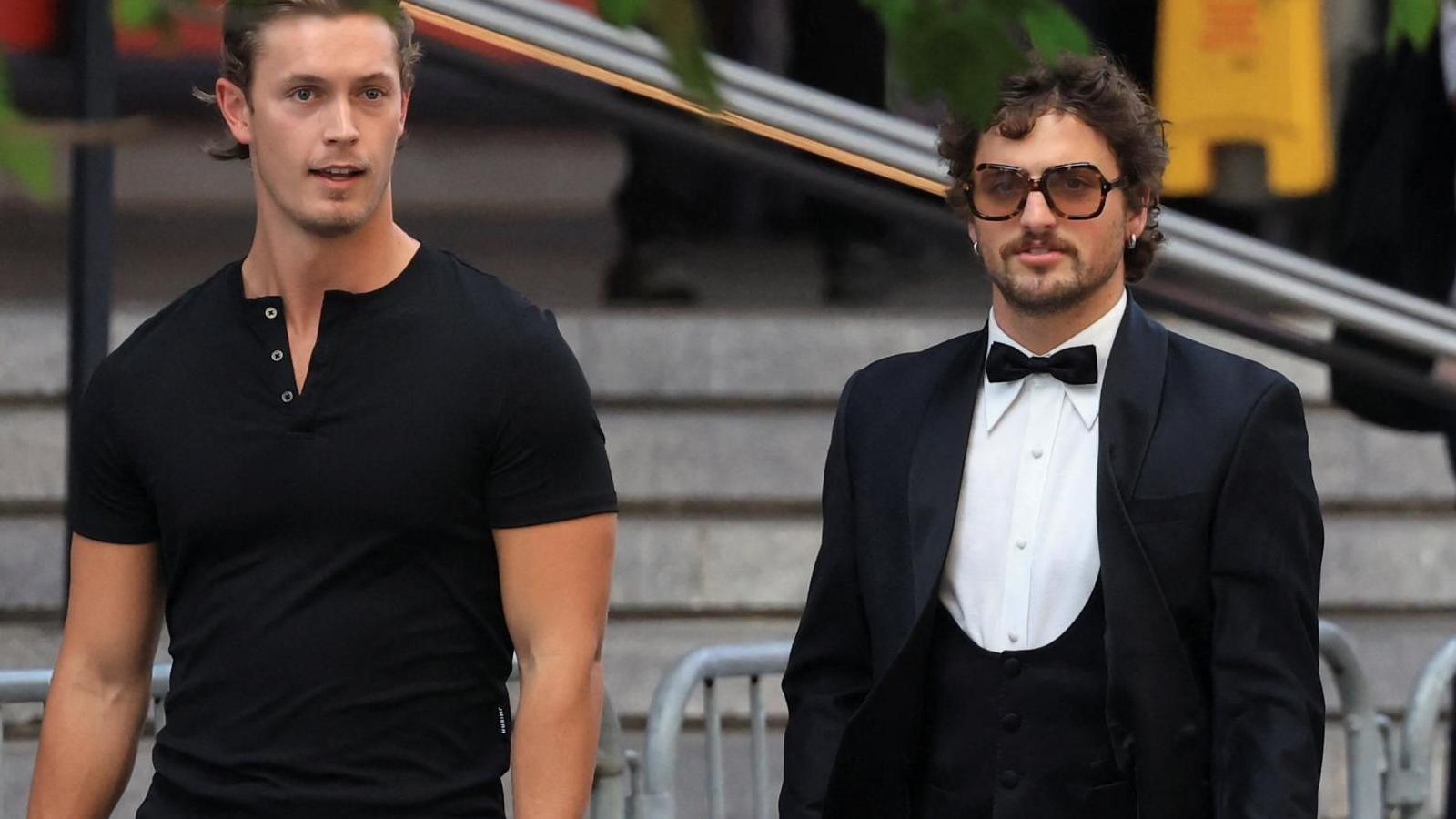 US singer Benson Boone, right, arrives at Madison Square Garden