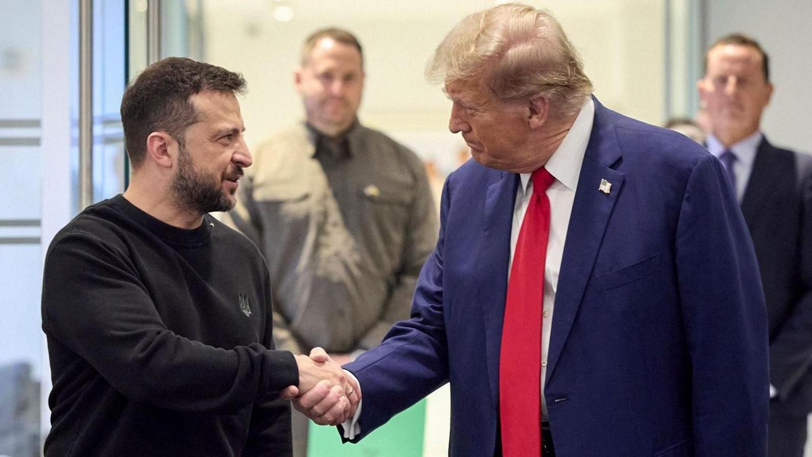 Zelensky and Trump shaking hands