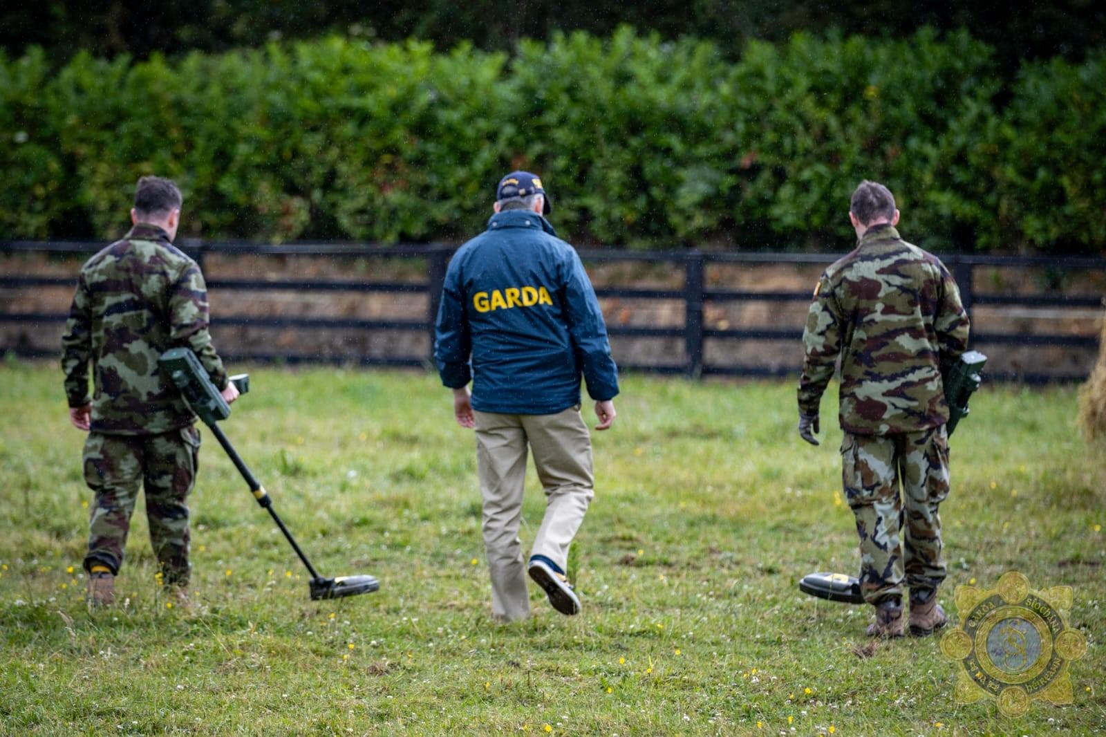 Gardaí use metal detectors to search lands near The Ward in Dublin