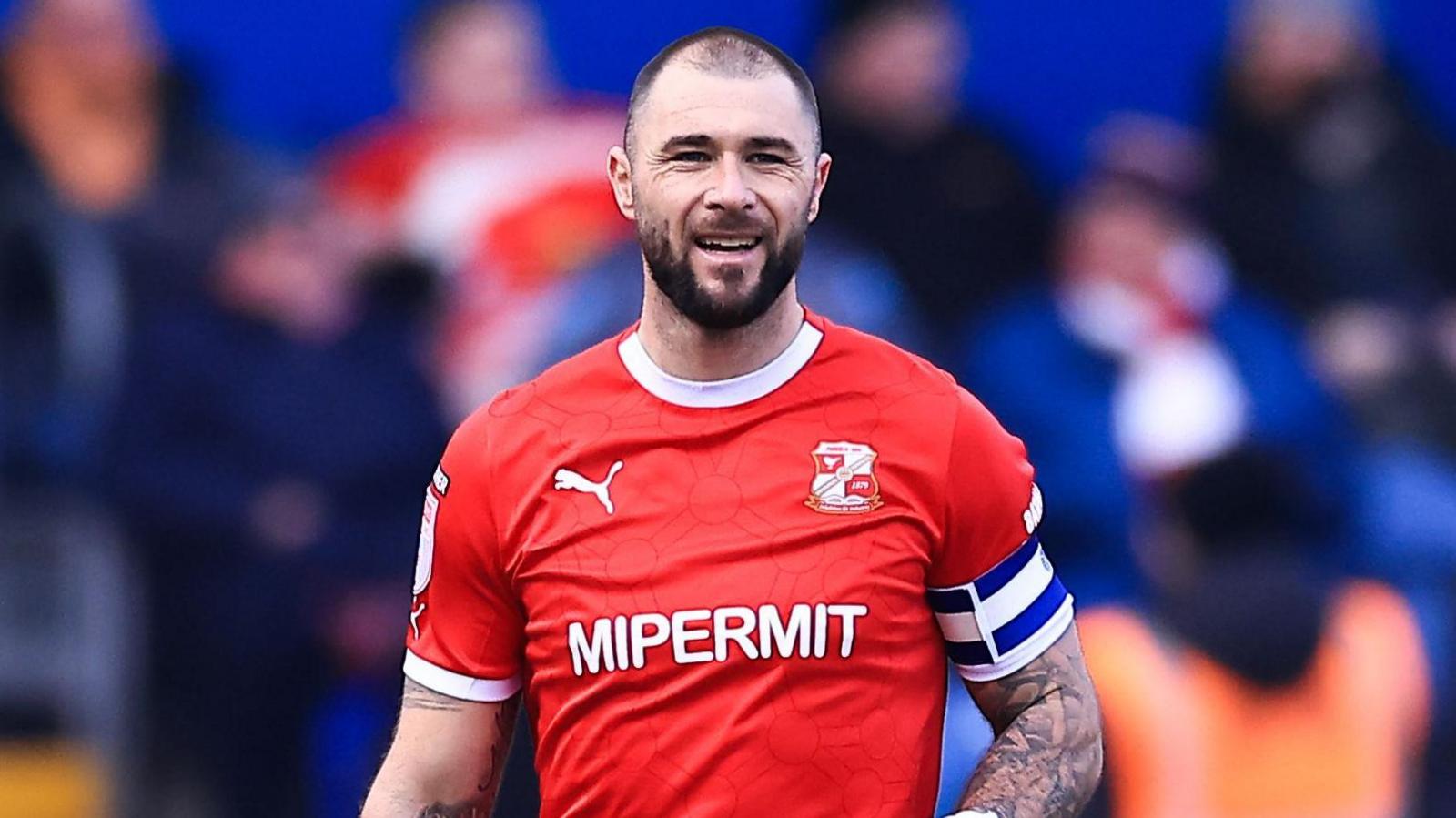 Charlie Austin in action for Swindon