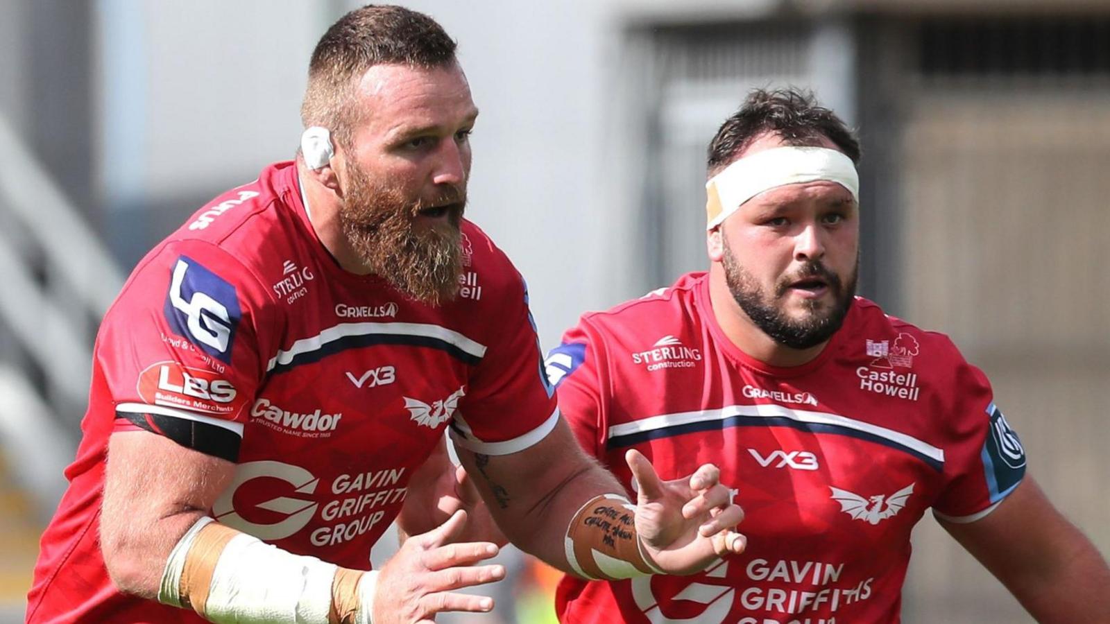 Jake Ball (left) of Scarlets with Harri O’Connor in support